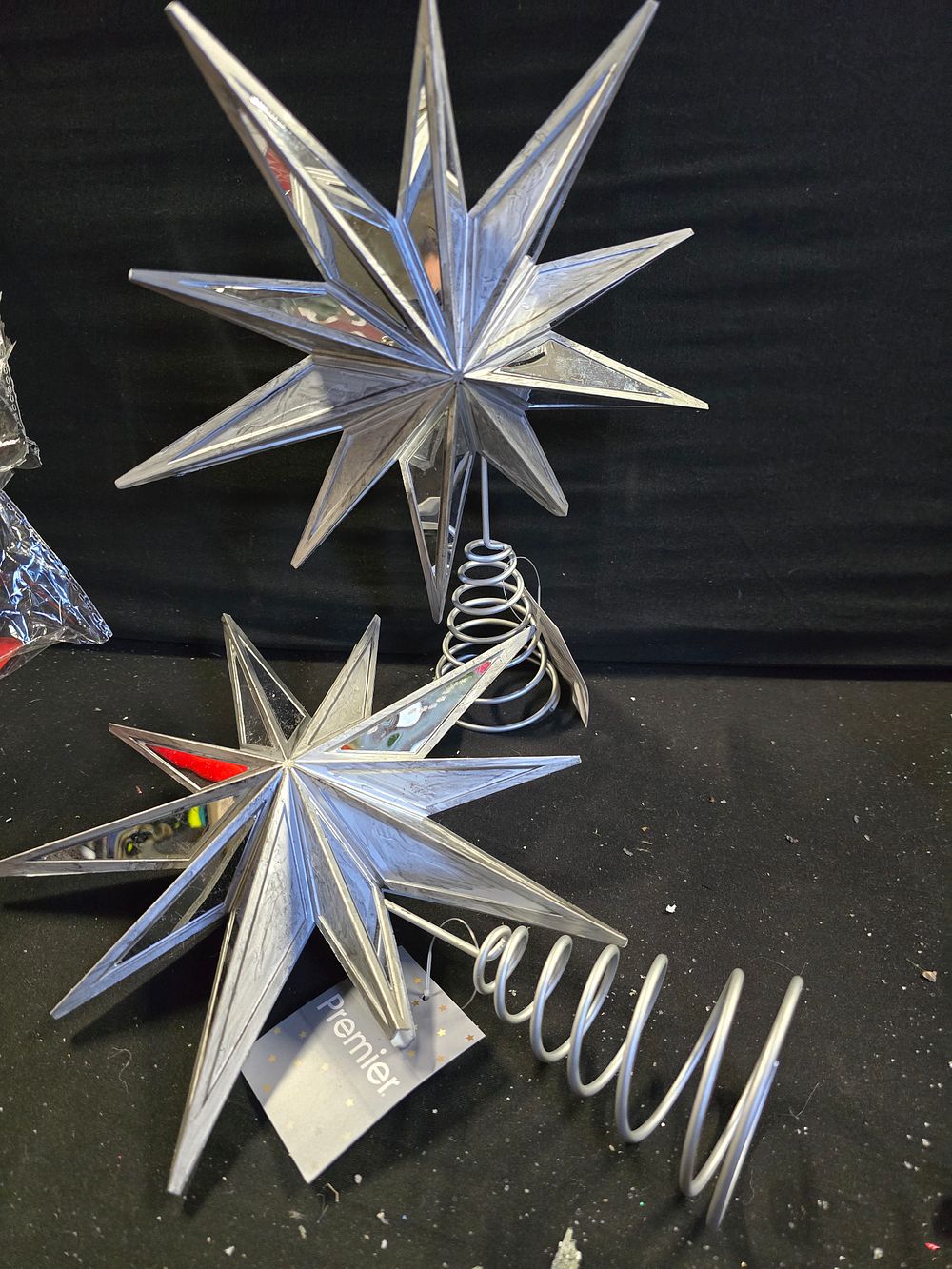 Lot 389: Two star tree toppers