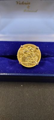 Ladies 22ct Gold sovereign mounted in a 9ct gold Size N/O. Weight approx 12.45g