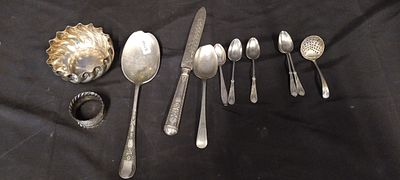 silver plated teaspoons. And 1 Sheffield sterling silver date F 1923