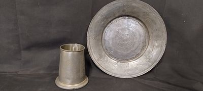 A pewter tankard engraved with The Kings Tankard, and a hand-engraved pewter plate