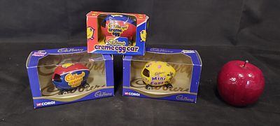 Three Corgi Cadbury Cream Egg cars