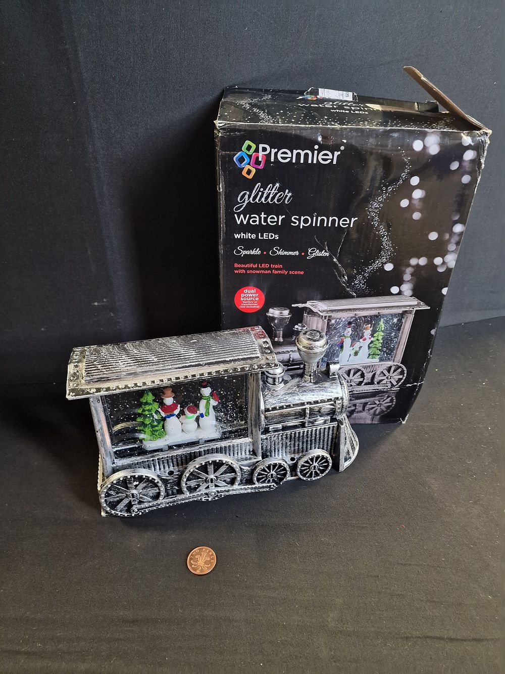 Lot 253: Beautiful LED Train with Snowman Family Scene Water Spinner Faulty NOT WORKING