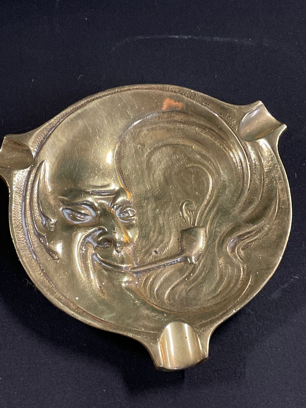 Lot 329: Brass Pipe smoking moon ashtray