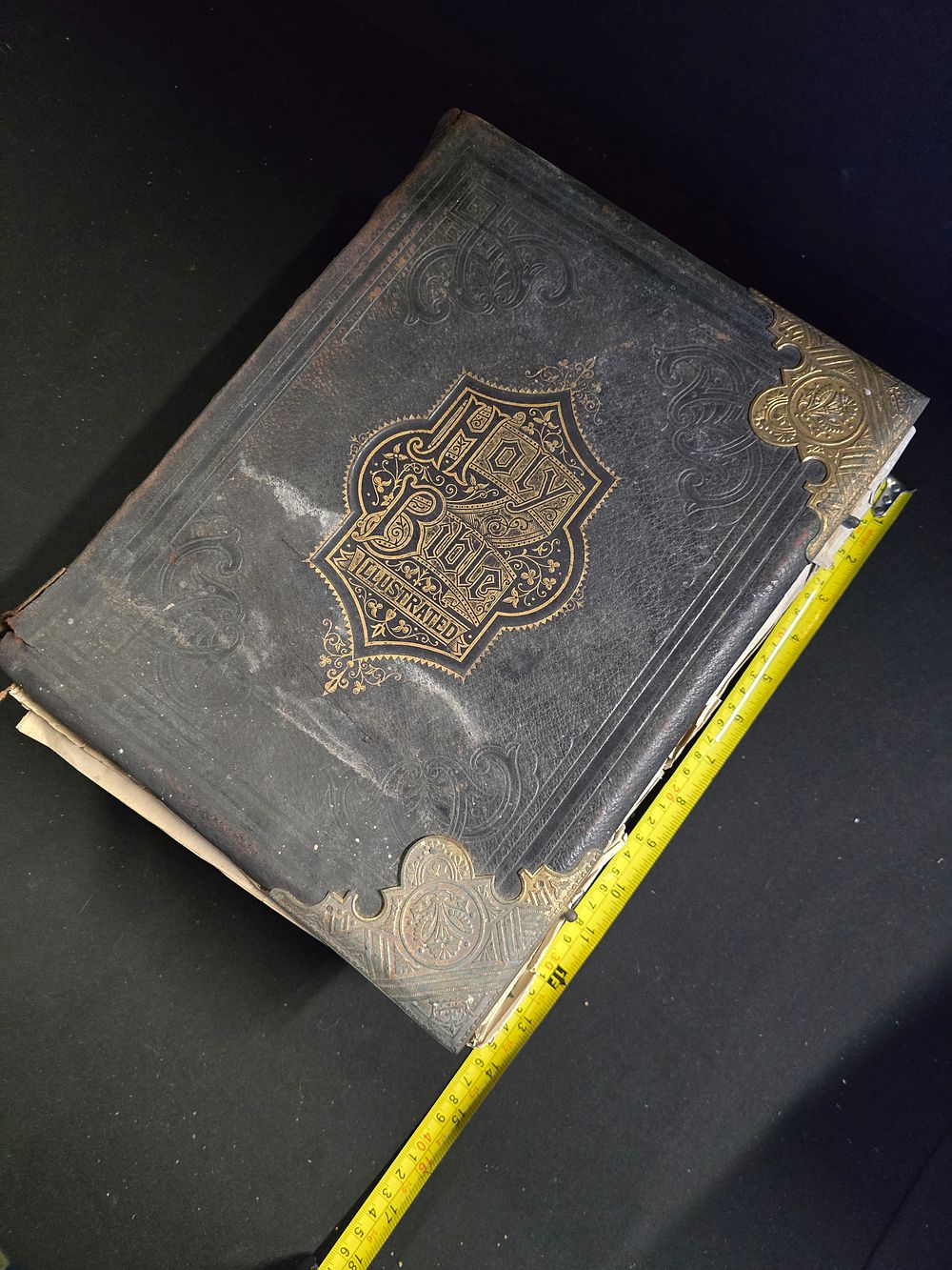 Lot 337: Large antique holy bible with brass fittings