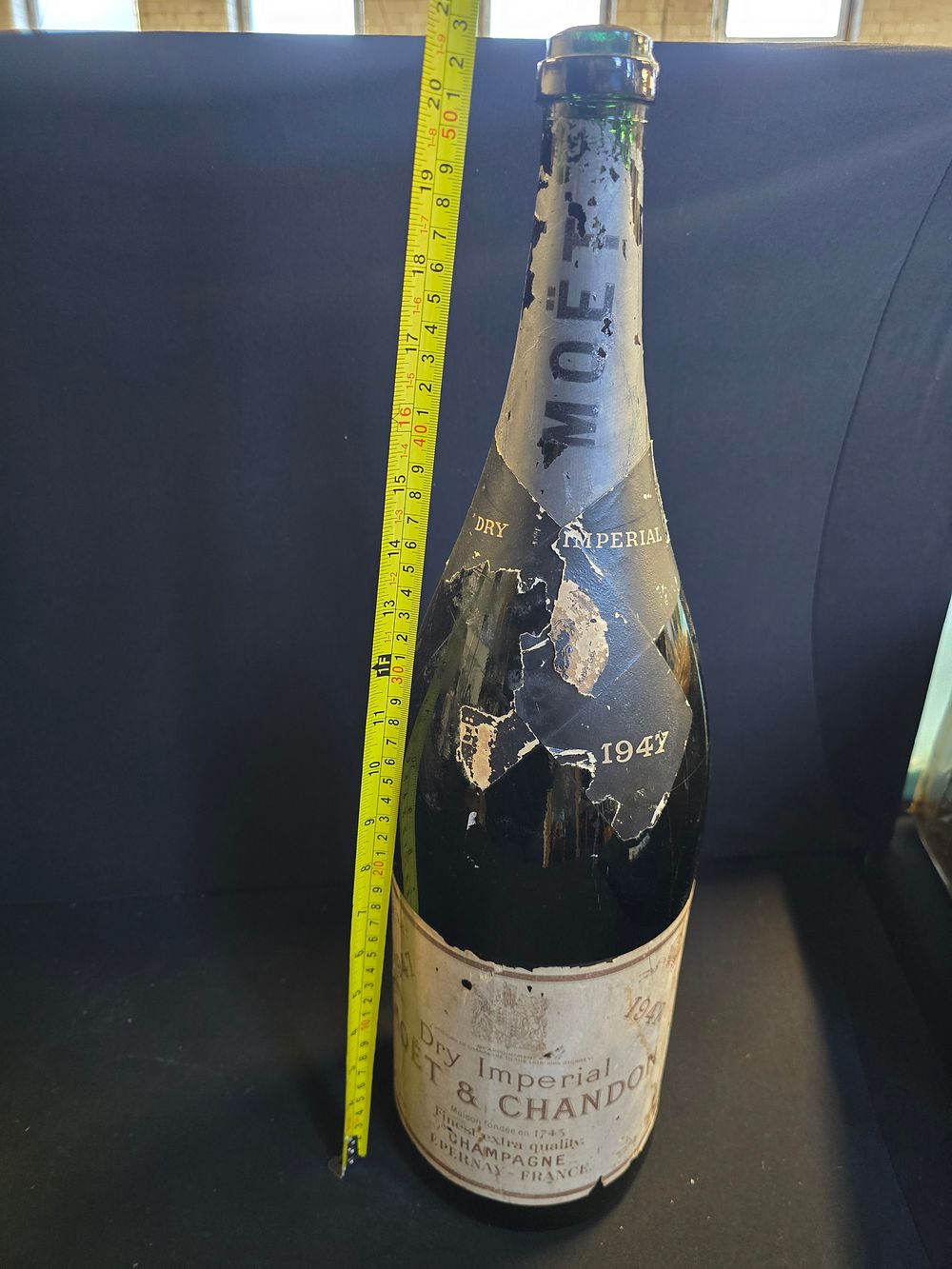 Lot 339: A large bottle of empty MOET from 1947