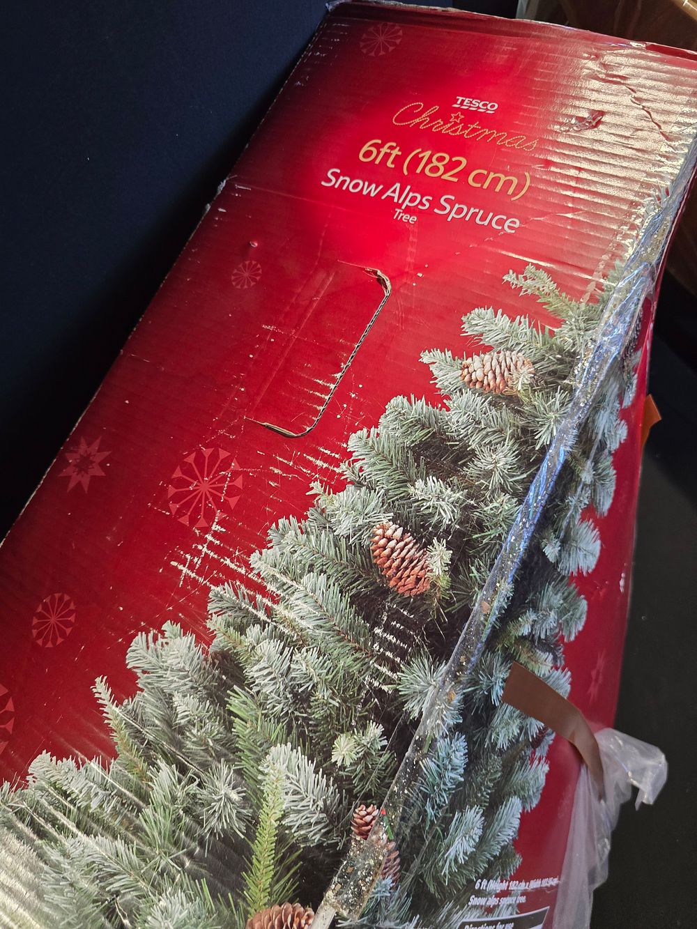 Lot 340: 6ft Snow Alps spruce Christmas tree from Tesco