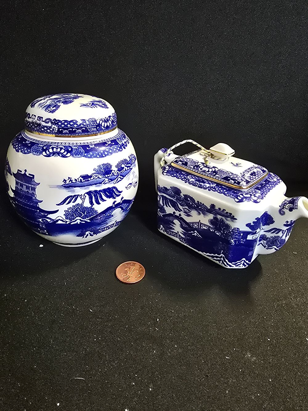 Lot 357: Ringtons tea caddy and tea pot