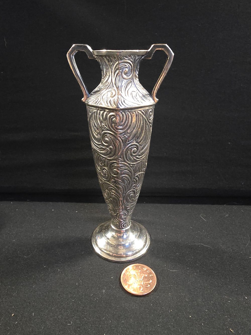 Lot 371: Silver plate posy vase