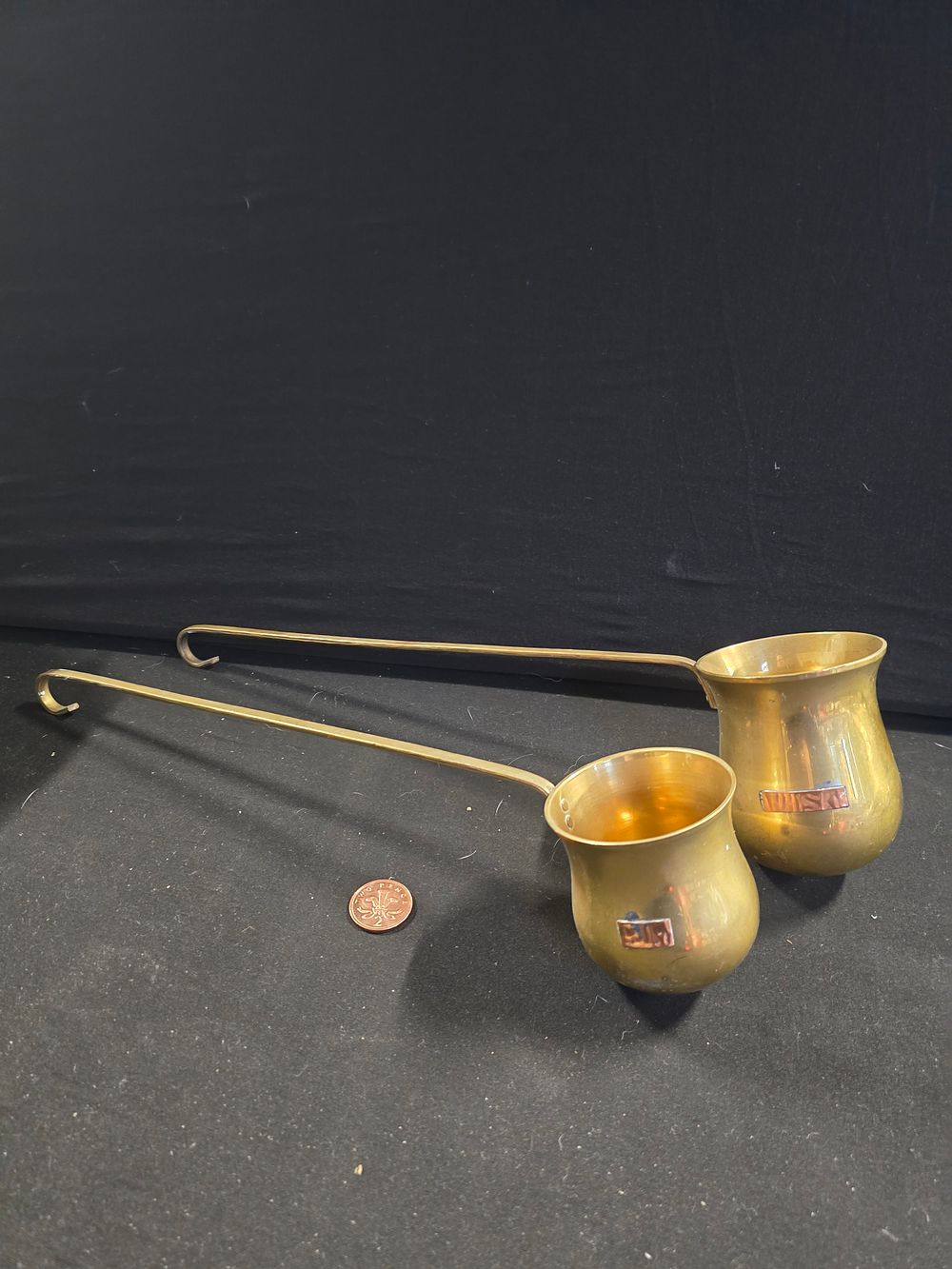 Lot 379: Two brass servers