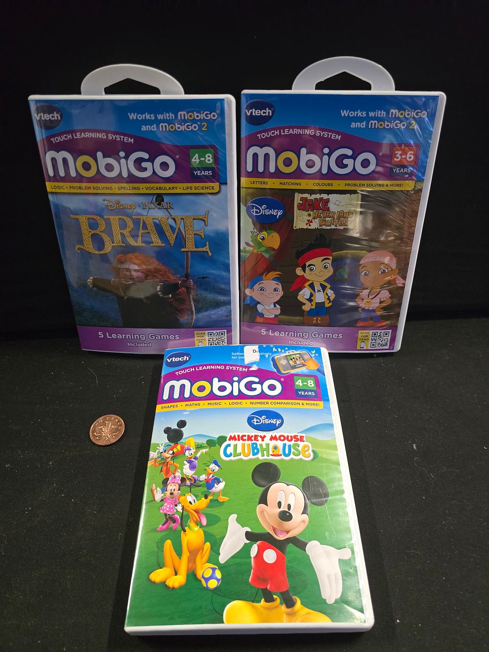 Lot 386: Three Vtech mobiGo games