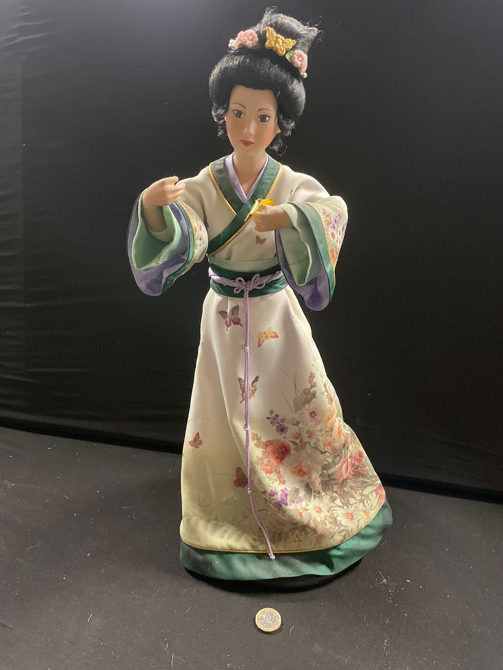 Lot 402: Large porcelain geisha girl with butterfly