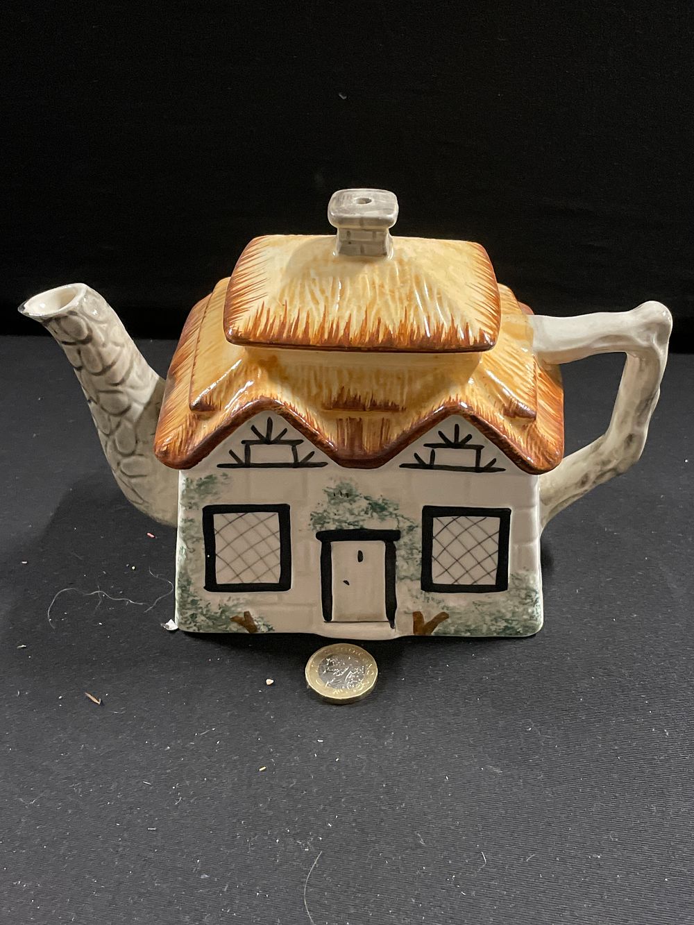Lot 412: Keele street collectables tea pot
