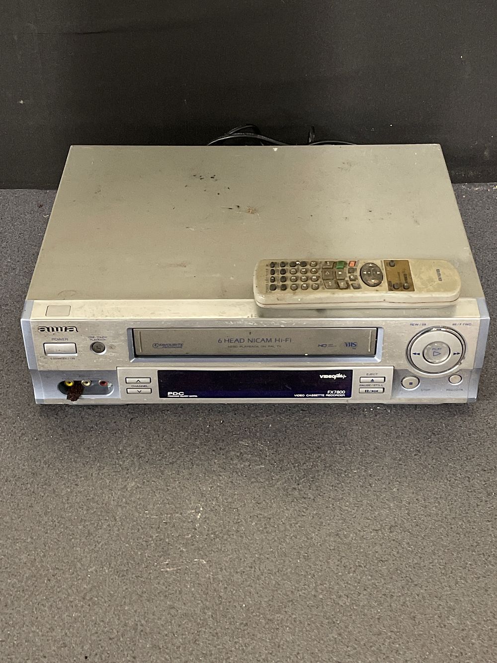 Lot 157: Vintage VHS recorder with nicam hi go and remote