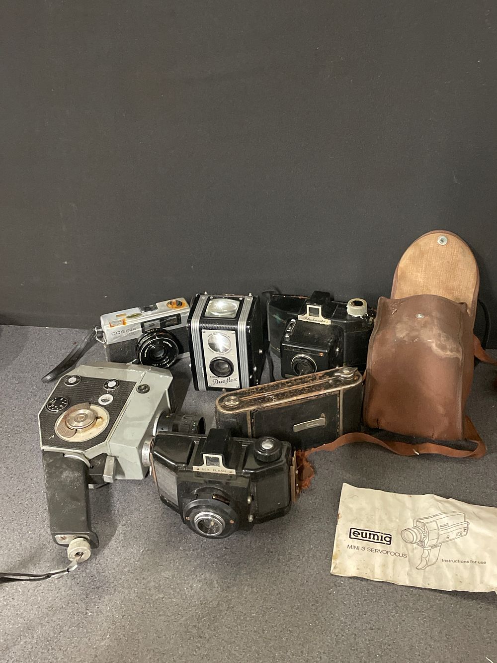 Lot 174: Large selection of vintage camera equipment