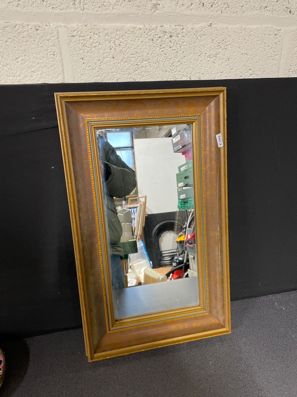 Lot 204: Small mirror in wood effect frame