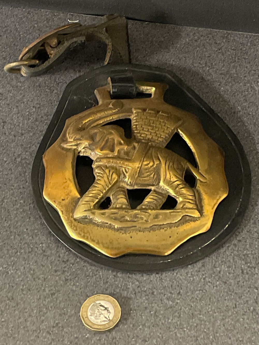 Lot 216: Vintage large brass horse brass with elephant casting