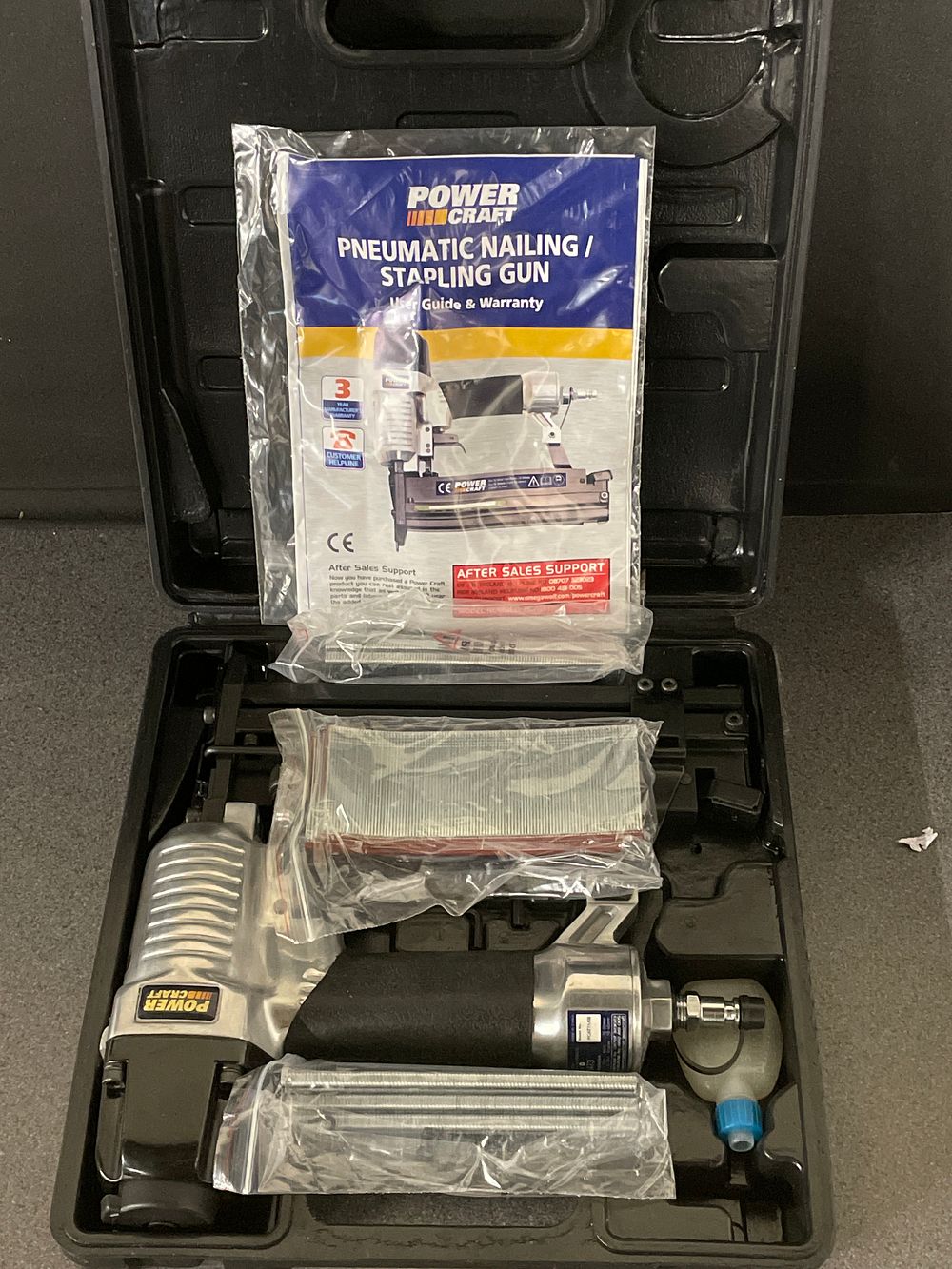 Lot 238: Brand new power craft pneumatic nailing/stapling gun