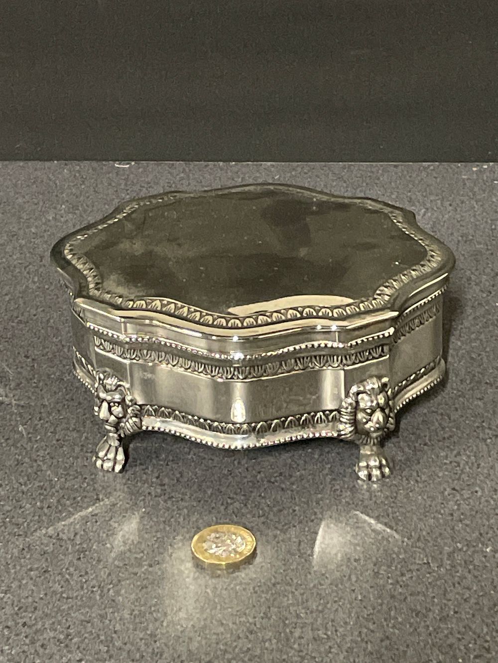 Lot 250: Silver plate trinket box