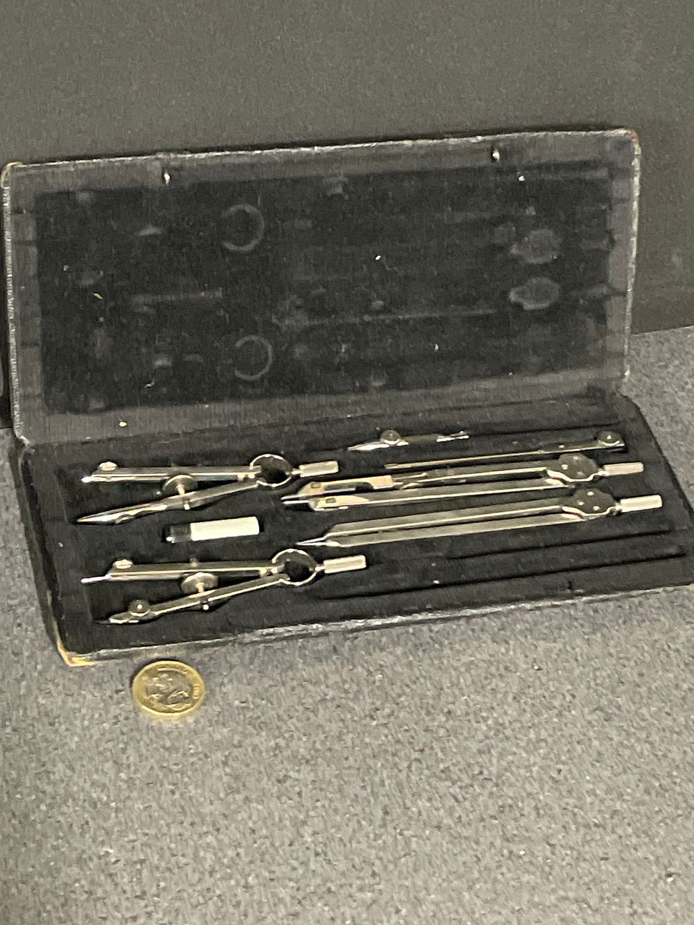 Lot 279: Box of vintage compasses
