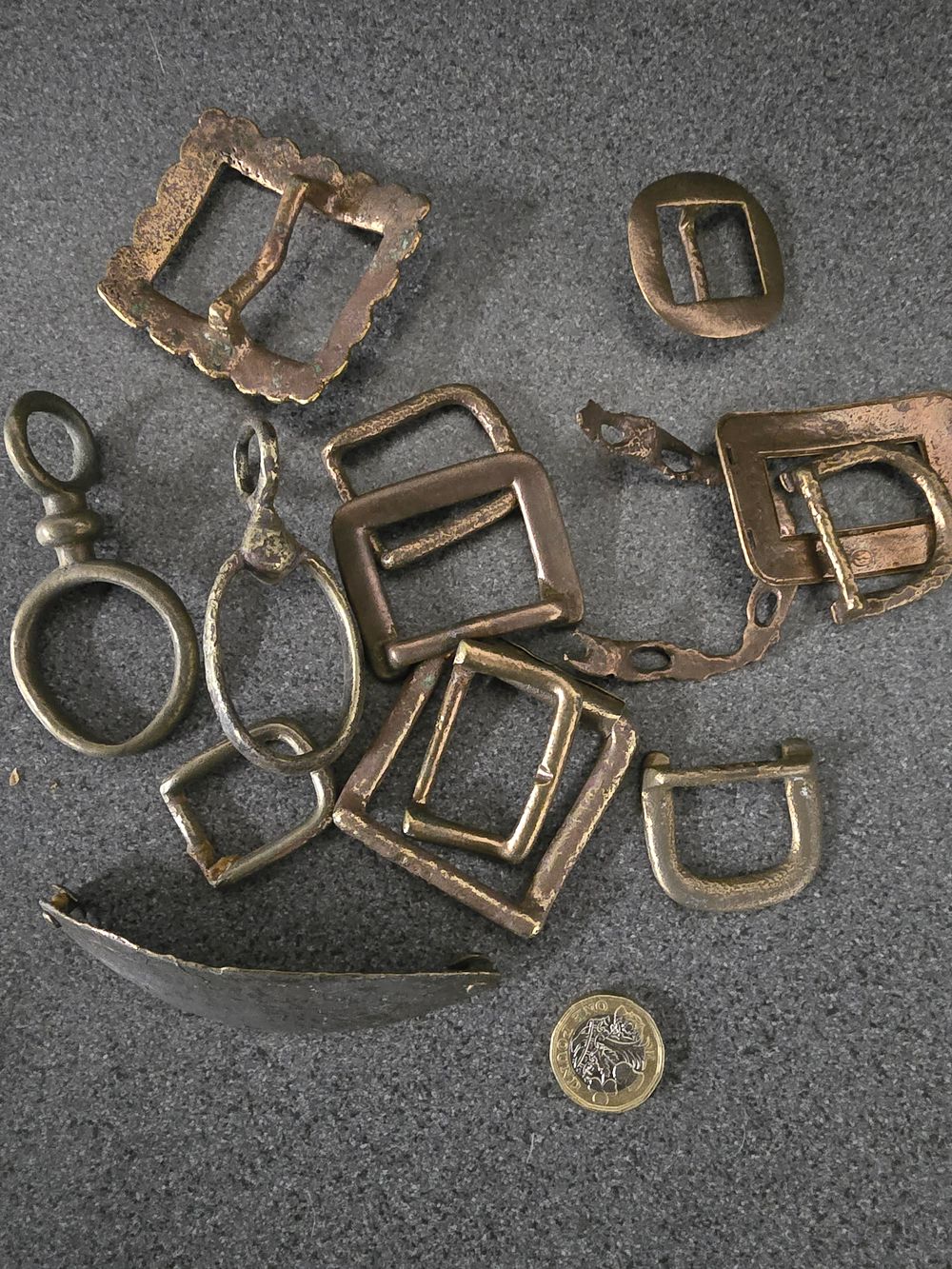 Lot 313: A collection of vintage brass buckles etc