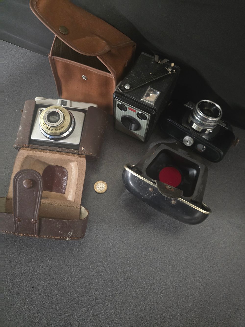 Lot 315: Three vintage cameras including Kodak