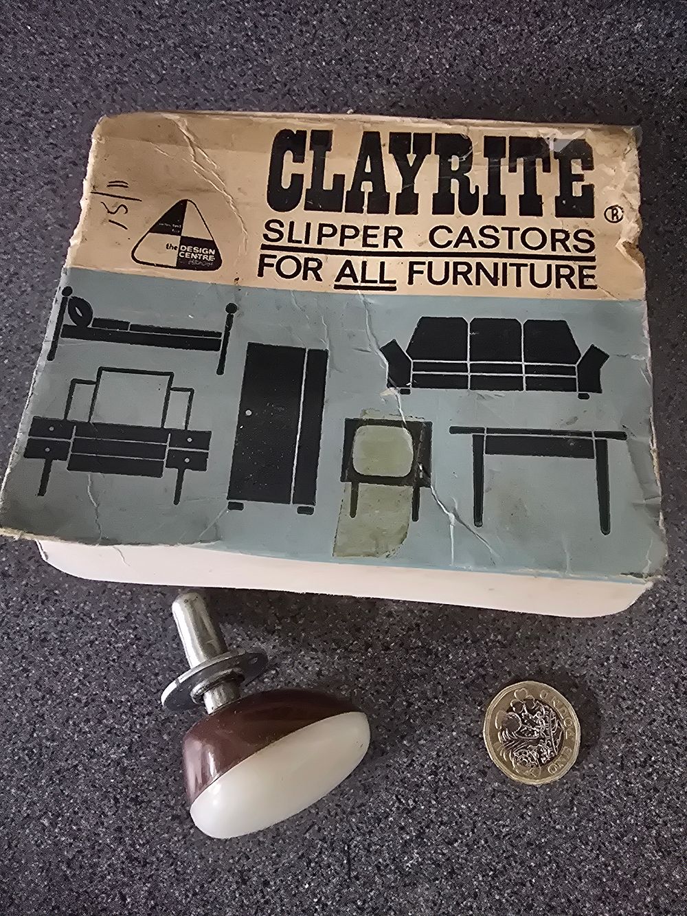 Lot 321: Four clayrite slipper casters