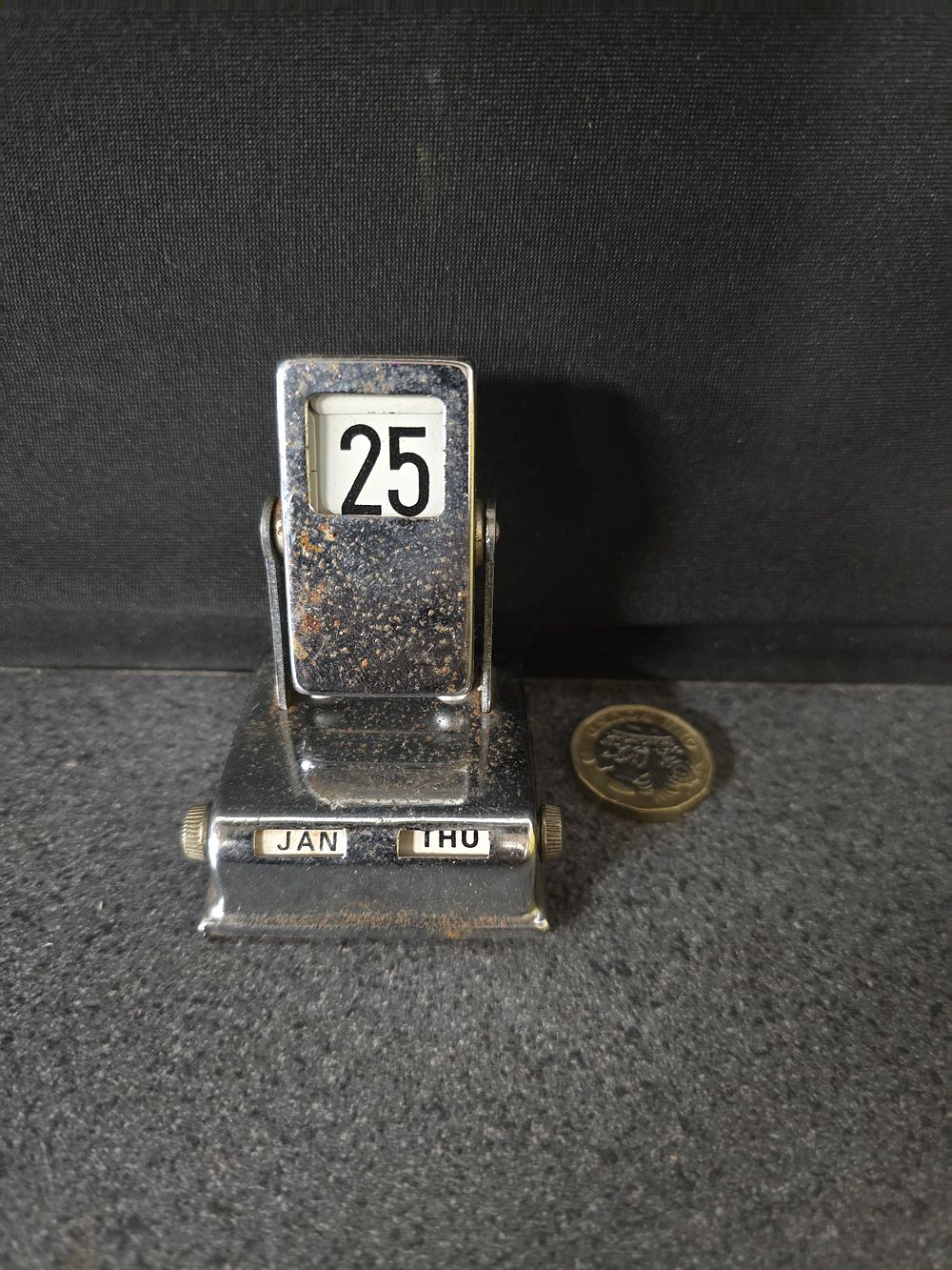 Lot 327: Vinatge metal calendar
