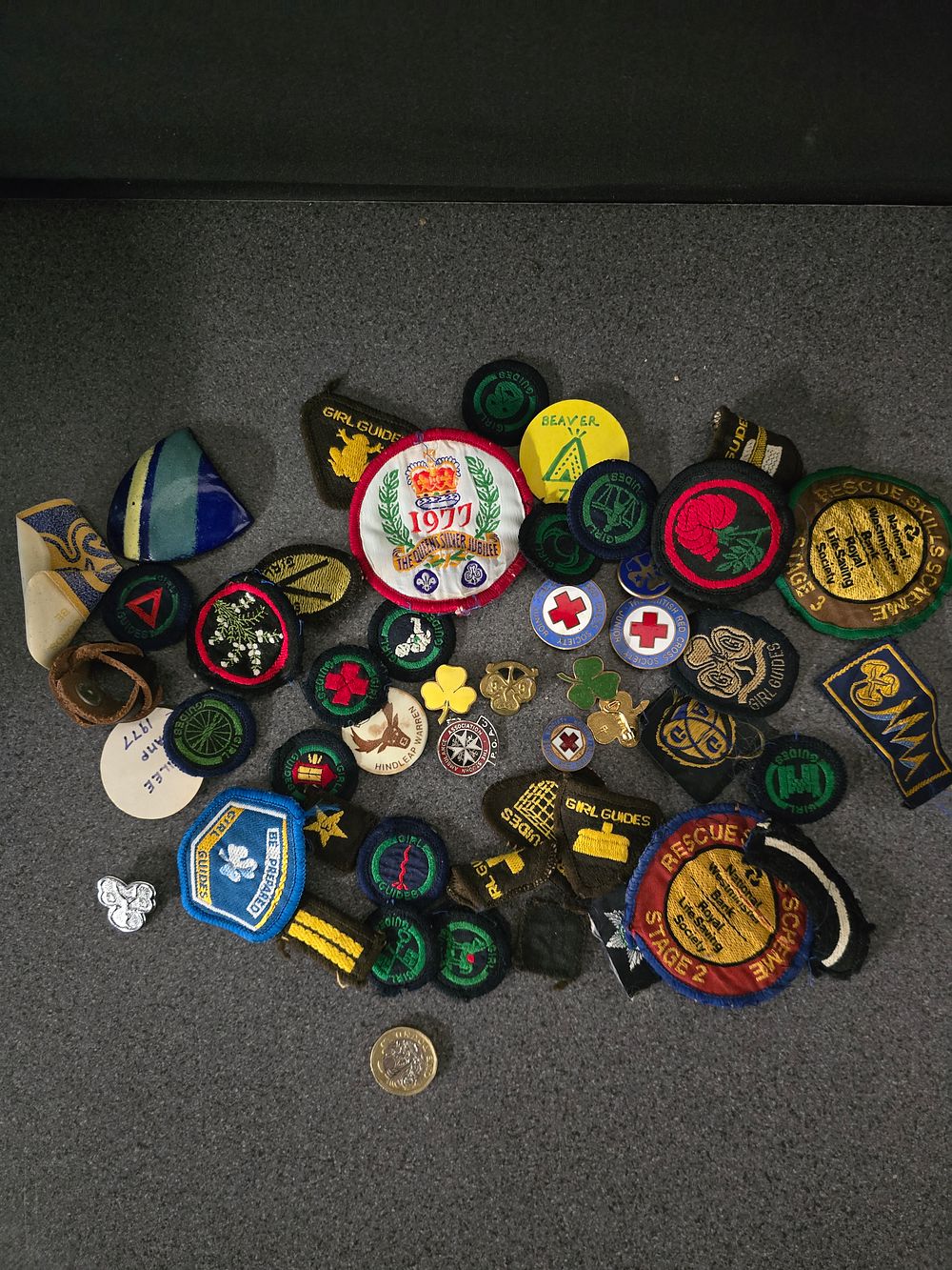 Lot 353: A large collection of vintage girl guide patches' and badges
