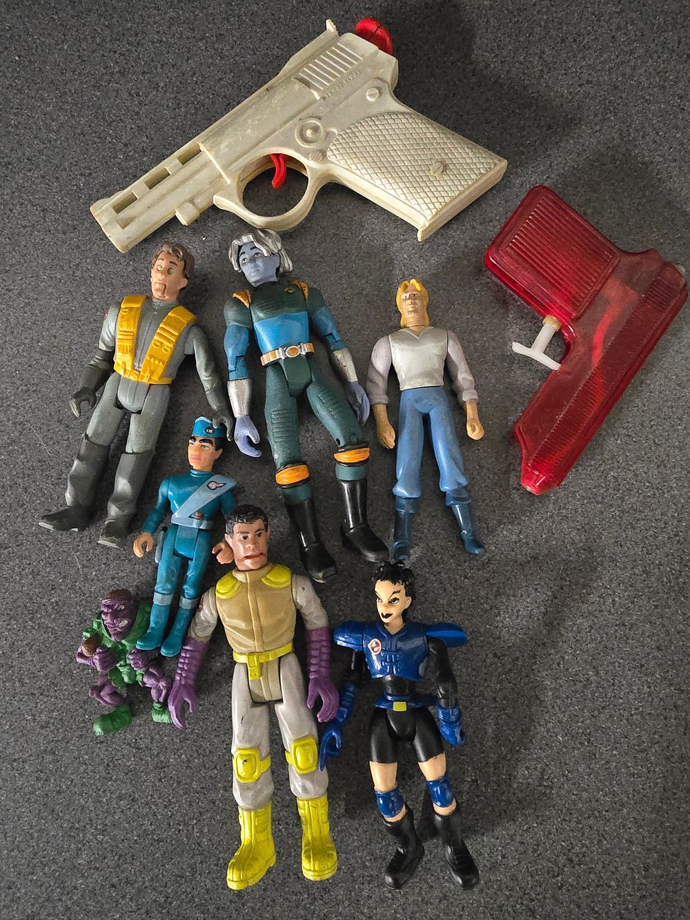 Lot 365: A collection of vintage characters includes ghostbusters