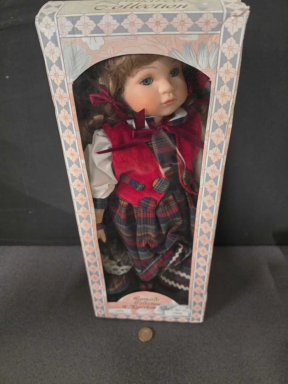 Lot 377: 18" porcelain doll - Josie