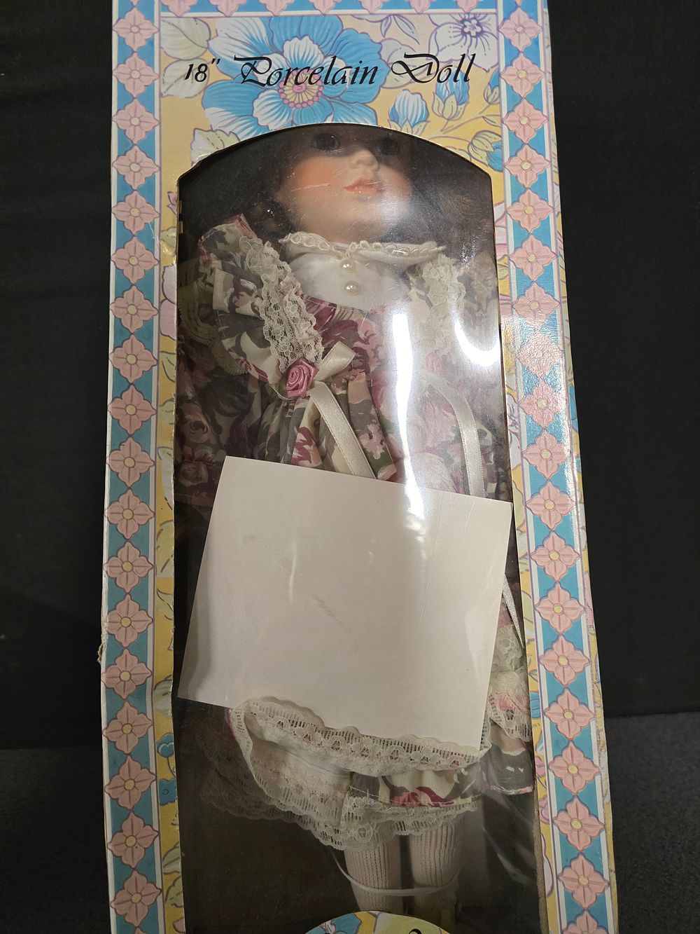 Lot 378: 18" porcelain doll Nicola