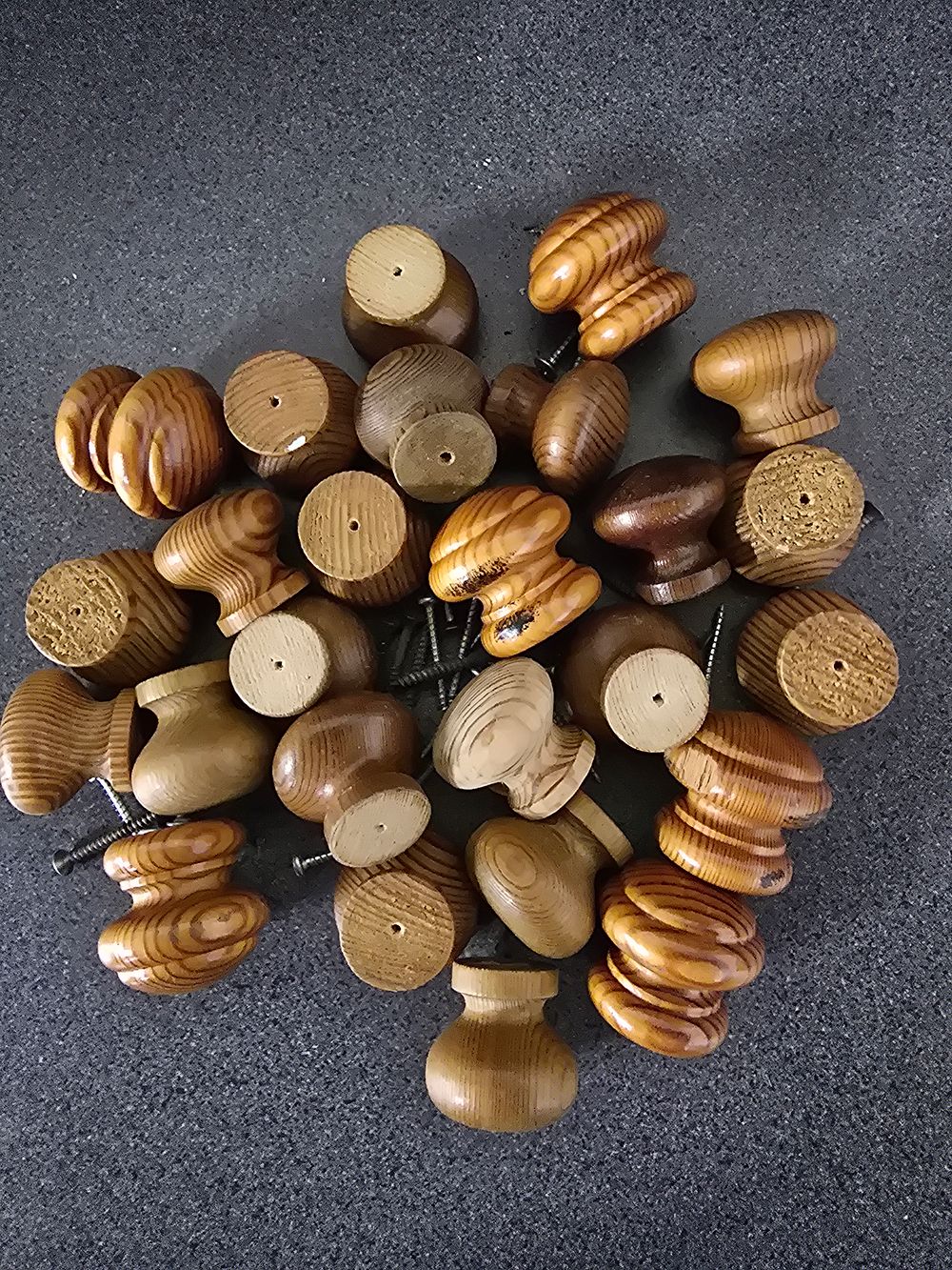 Lot 380: A large collection of pine dressers handles