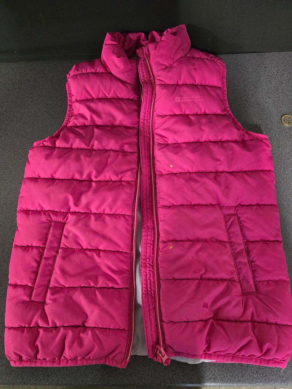 Lot 384: Girl 9-10yrs pink gilet by Mountain warehouse