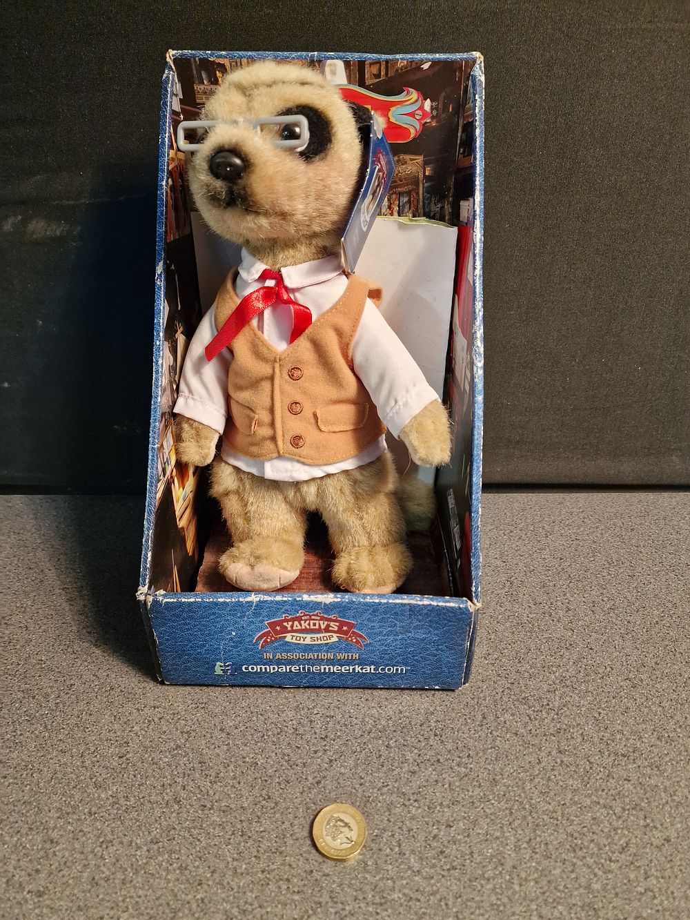 Lot 154: Compare the Meerkat Yakov Soft Toy