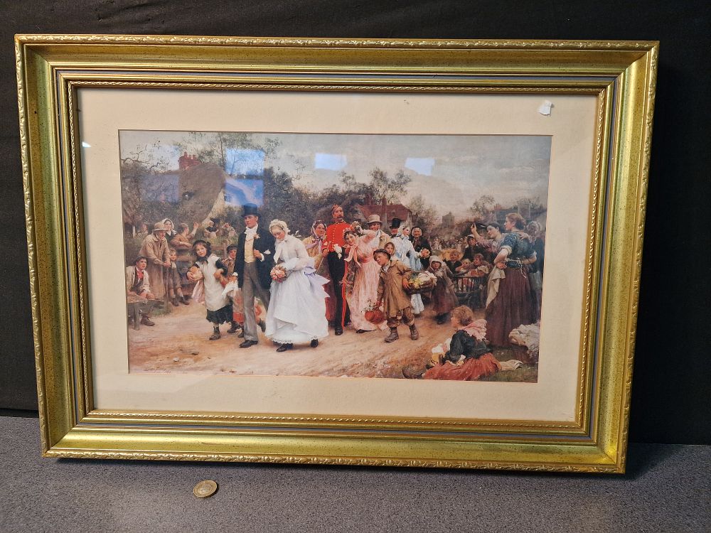 Lot 214: Framed Print of The Village Wedding, taken from Sir Luke Fildes. Approx 64x46cm