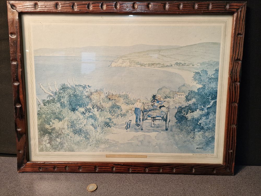 Lot 216: Framed Print of The Coast of Antrim Northern Ireland by Sturgeon. Approx 57x44cm