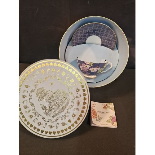 Lot 262: A collectable Wedgewood "The Tea Garden" cup and saucer, Boxed