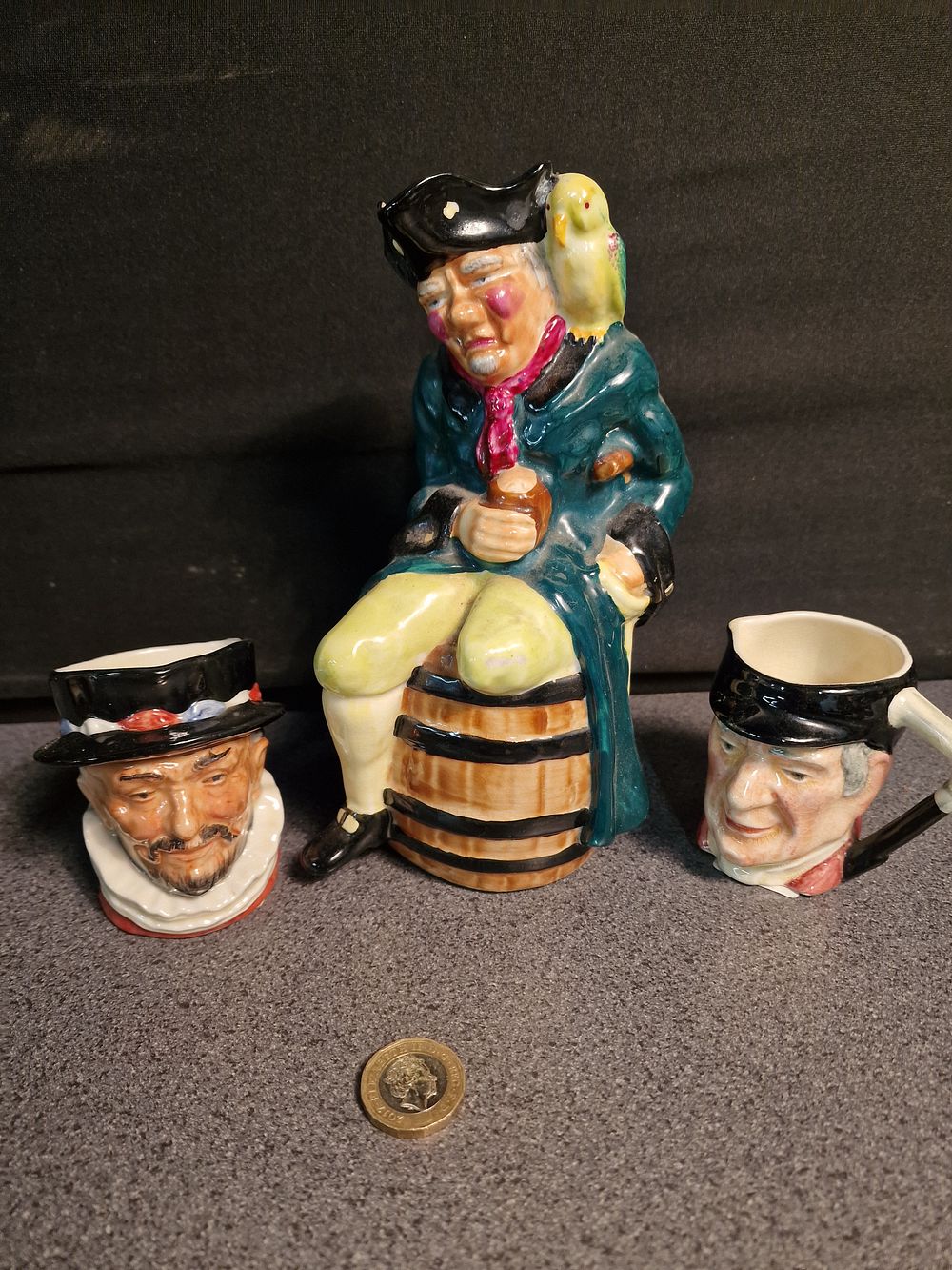 Lot 264: Three Character Jugs inc Royal Doulton