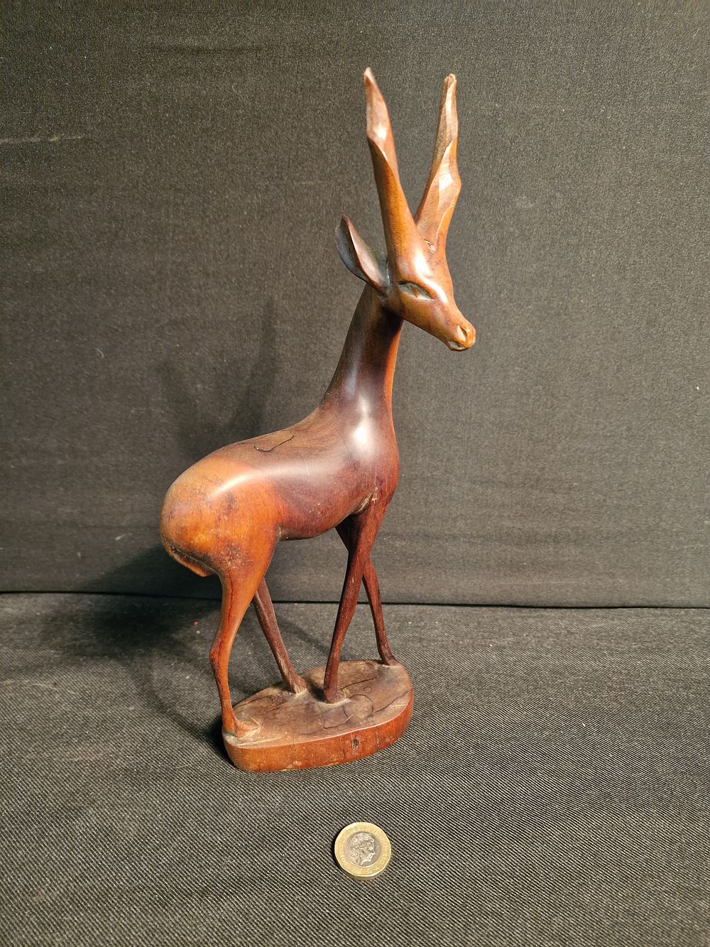 Lot 156: Beautiful Carved Wood Spiral Horned Antelope Figurine. Damage to Horns a/f