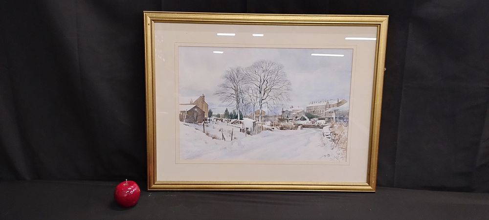 Lot 152: Framed watercolour painting of a winter village scene...
