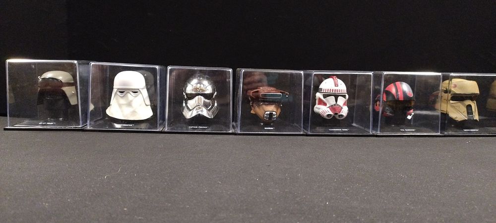 Lot 283: 7 Collectable Star Wars miniature helmets, Snow Trooper,...