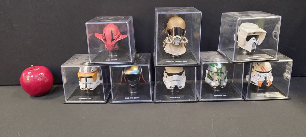 Lot 301: 8 x collectable miniature Star Wars helmets, Stormtrooper,...