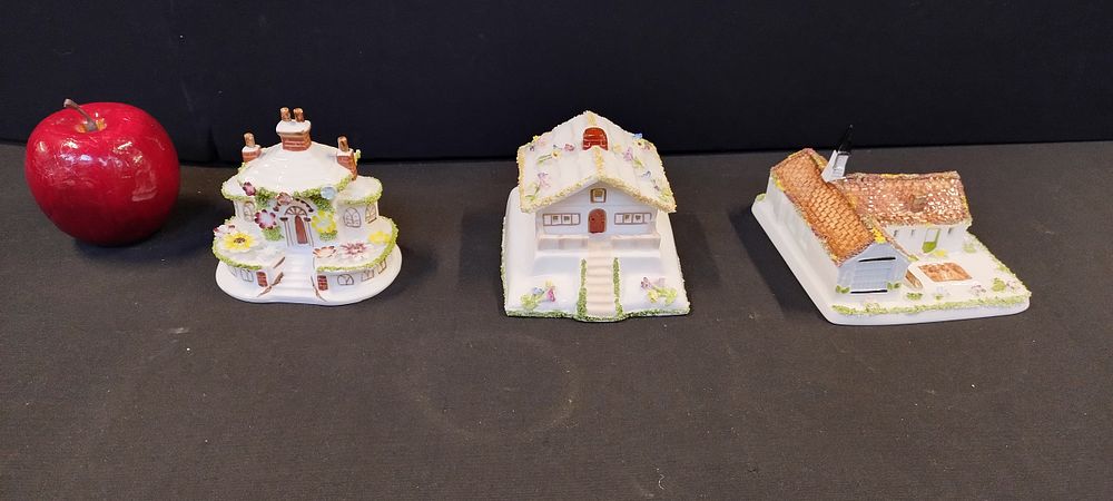 Lot 306: Three Coalport collectable miniature cottages. Keepers Cottage,Swiss Cottage...
