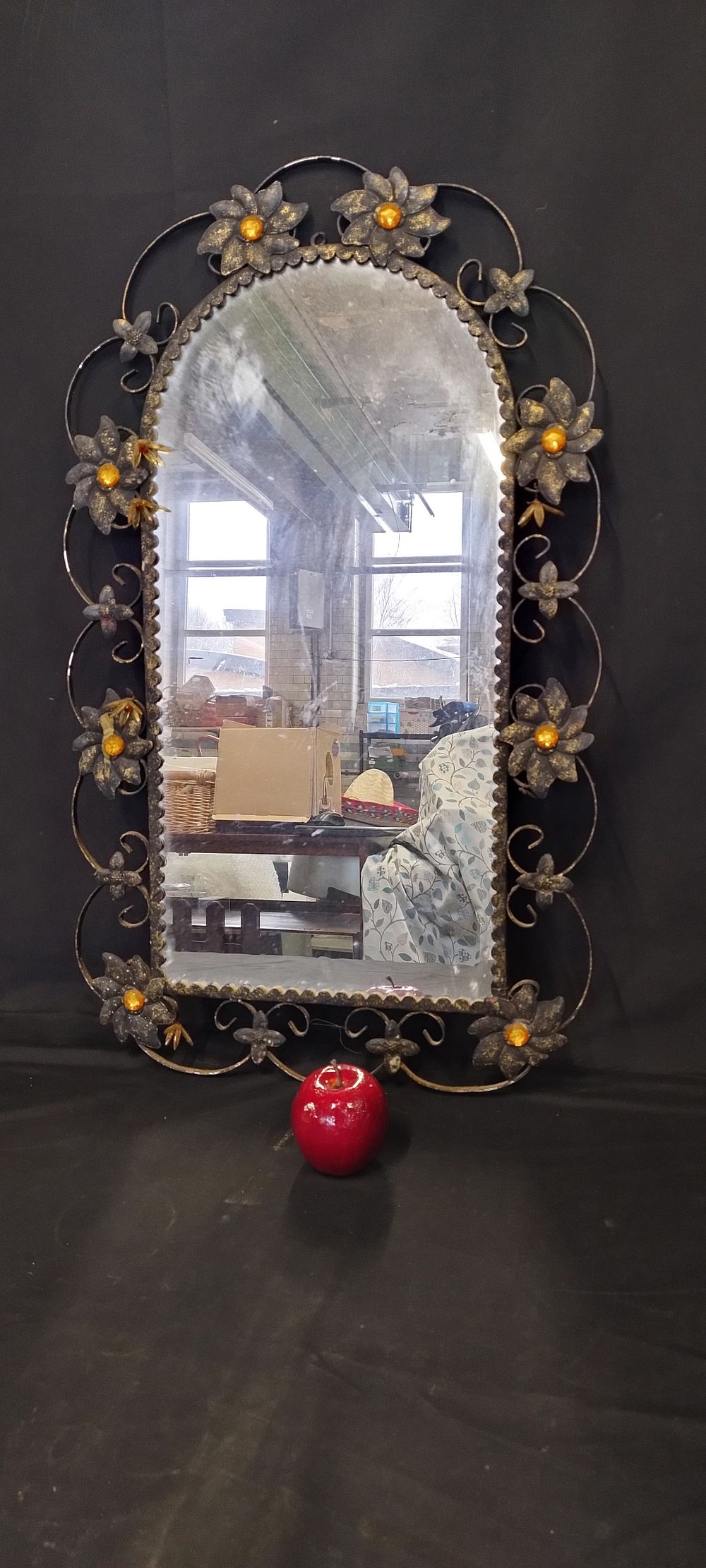 Lot 321: Vintage metal framed mirror with flower decoration. Measures...
