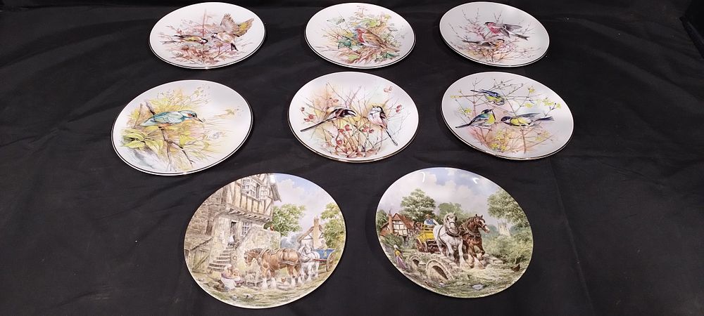 Lot 329: Eight collectors plates featuring various bird decorations and...