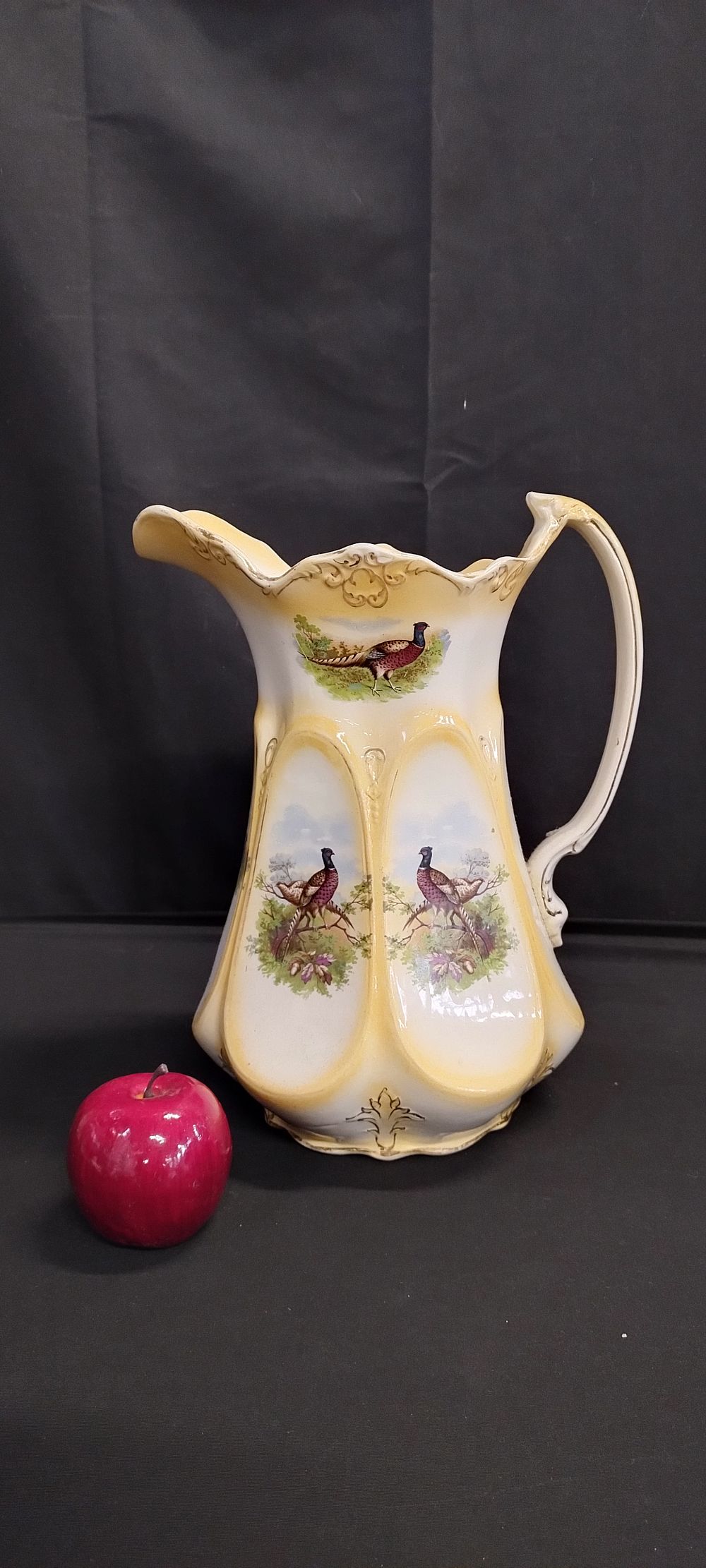 Lot 341: Large ceramic pitcher with pheasant decoration