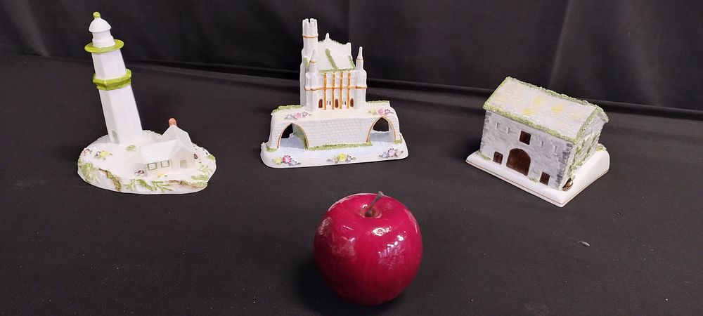Lot 348: Three Coalport collectable miniature cottages. The lighthouse,The Chantry...