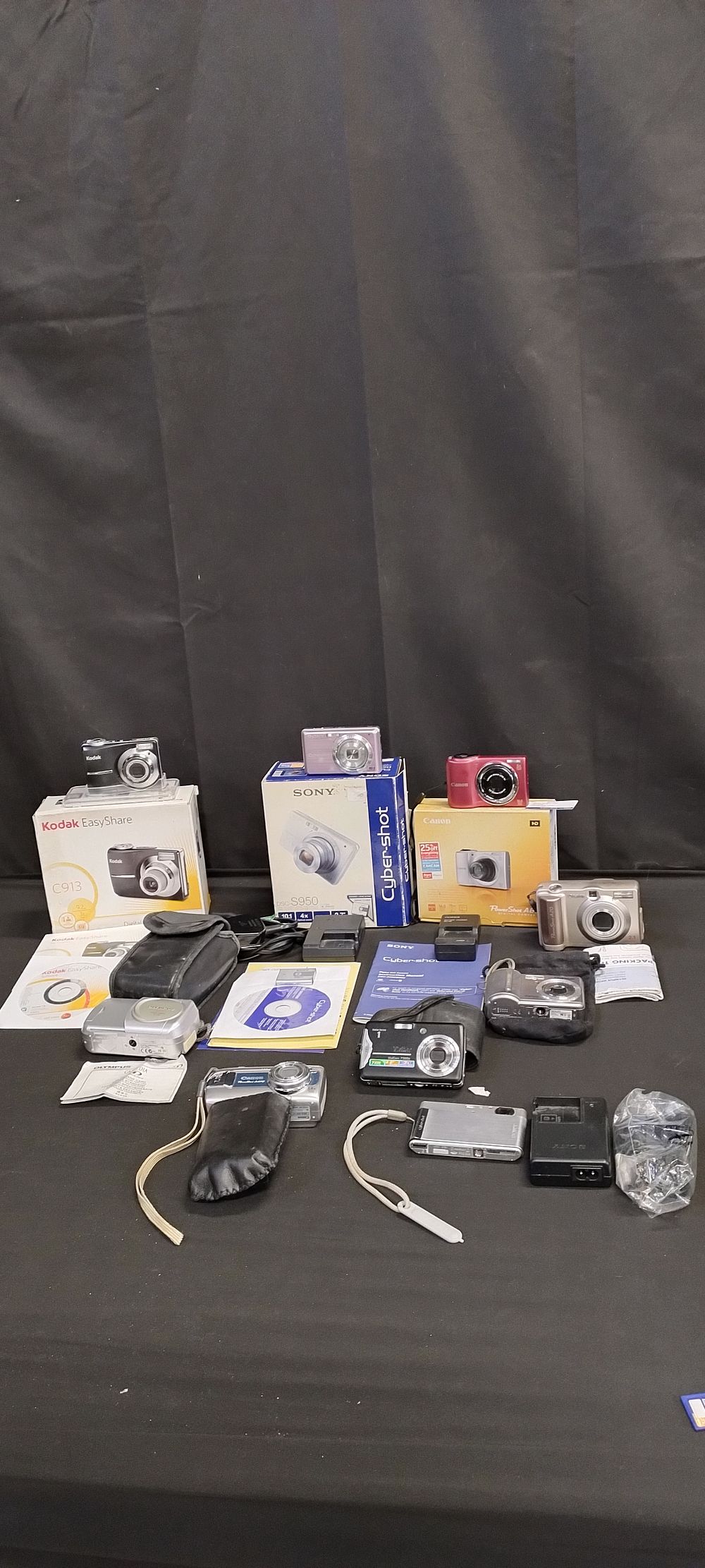Lot 350: Collection of various digital cameras, Sony, Canon, Olympus,...