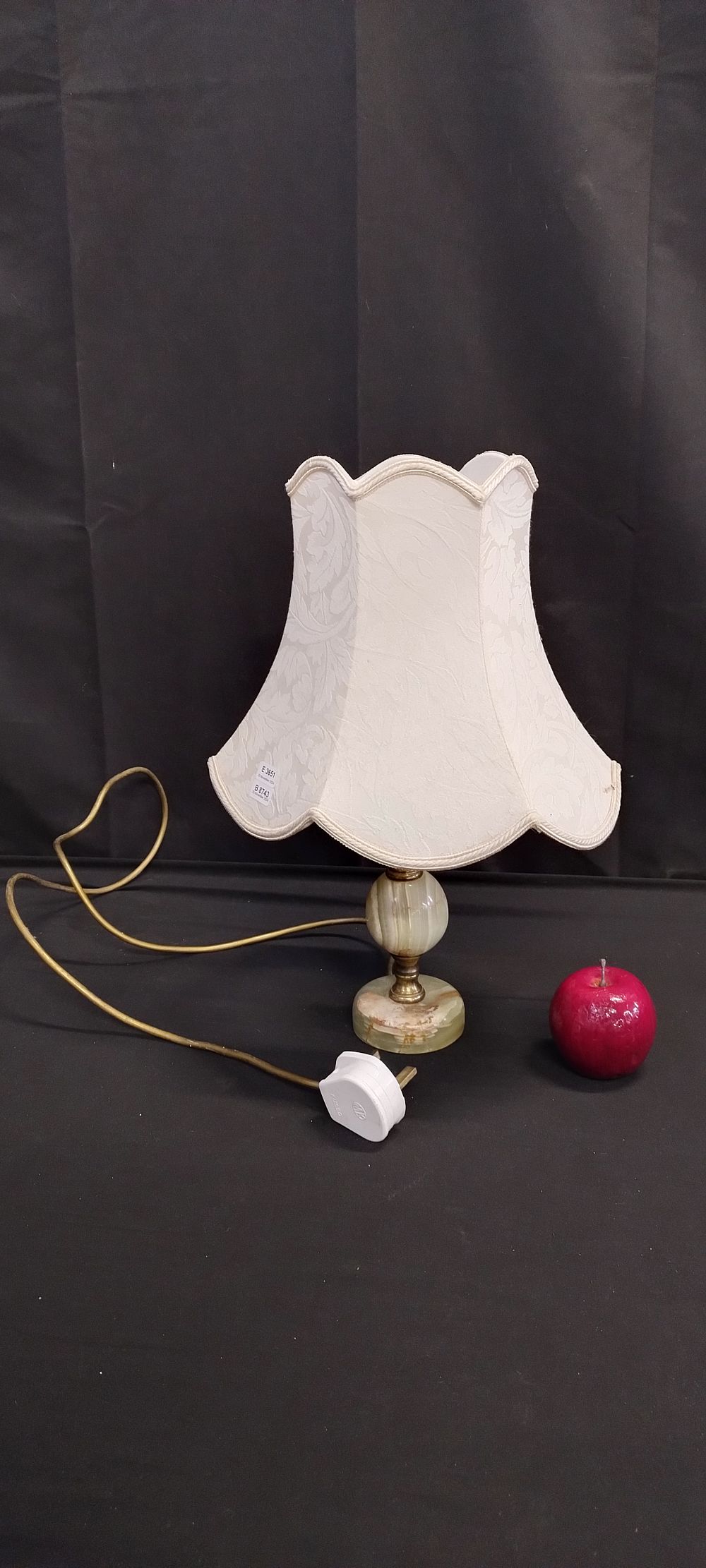 Lot 366: Onyx and brass table lamp with cream jacquard...