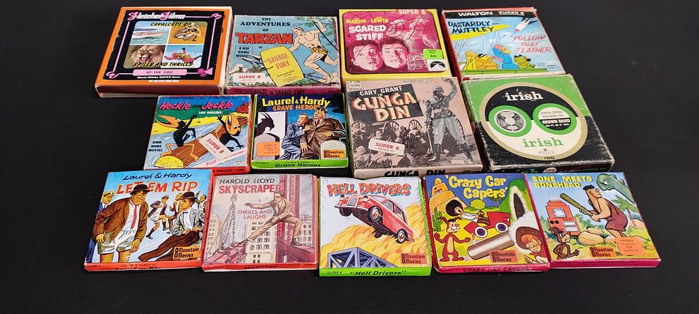 Lot 376: 13 boxed super 8 flimsy and cartoons including...